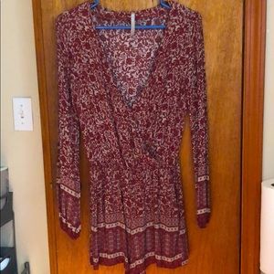 Floral, maroon, long sleeved romper. Has pockets!